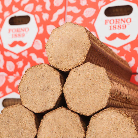 Close-up of stacked Forno1889® Beechwood Pizza Briquettes – 100% FSC®-certified hardwood logs by ECOFUEL™